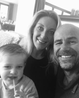 Jolyn Bosz with her husband Peter Bosz and grandson.